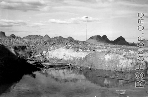 After: Exploded bridge with explosives at Liuzhou before the Japanese advance during Ichigo in the fall of 1944. 