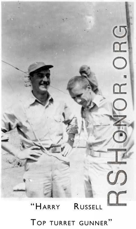 "Harry Russell, top turret gunner." And monkey. 10th Air Force, 7th Bombardment Group, 9th Bombardment Squadron.  During WWII.