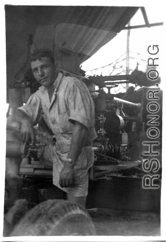 Men of the 2005th Ordnance Maintenance Company,  28th Air Depot Group, working on an anti-aircraft gun in Burma. During WWII.