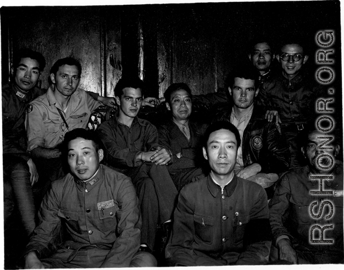 Both Chinese and American soldiers pose with KMT civilian official at rally. This should be An Zefa (安则法), a highly educated official who had a number of roles in Yunnan during WWII.