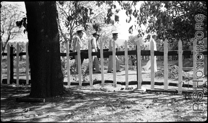 Solemn burial ceremony for American GIS who had died at a temporary war-time graveyard. In the CBI, during WWII.