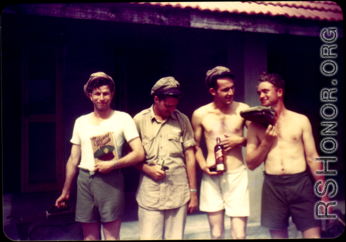 American flyers goof in front of barracks in China.