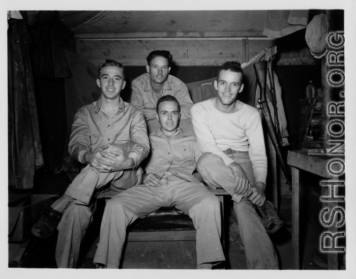 Engineers of the 797th Engineer Forestry Company pose in their barracks in Burma.  During WWII.