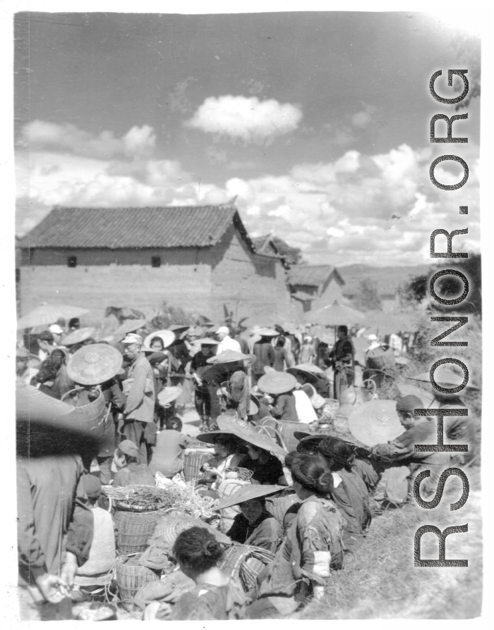 Market day at Zhanyi, Yunnan, China, during WWII.