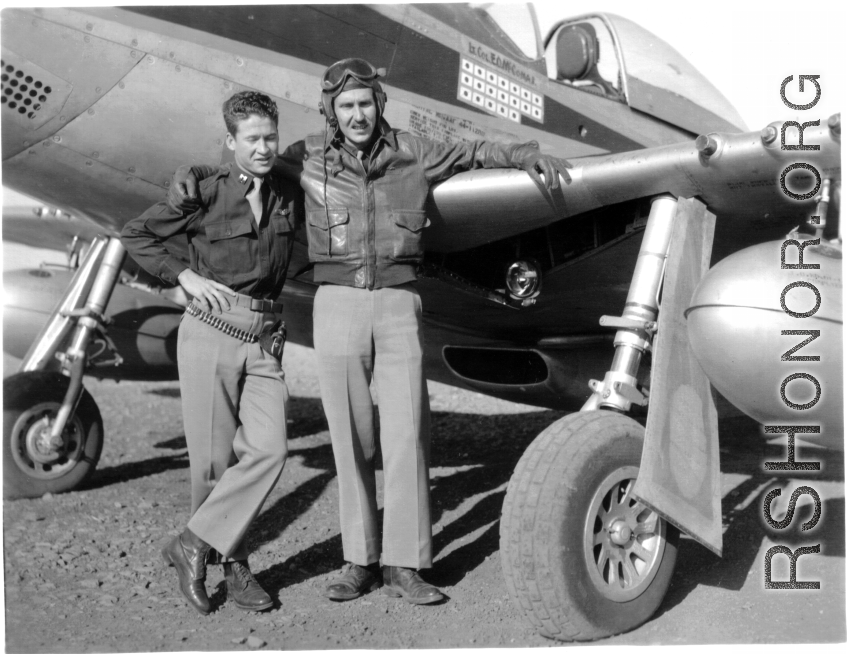 Col. Ed McComas and another man in front of Col. McComas' P-51D fighter (#44-11280) during WWII in the CBI.