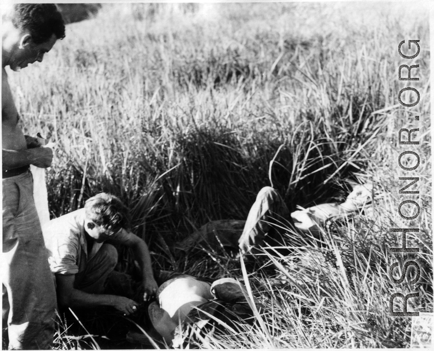 A medic tending to an victims of the bomb mishap.