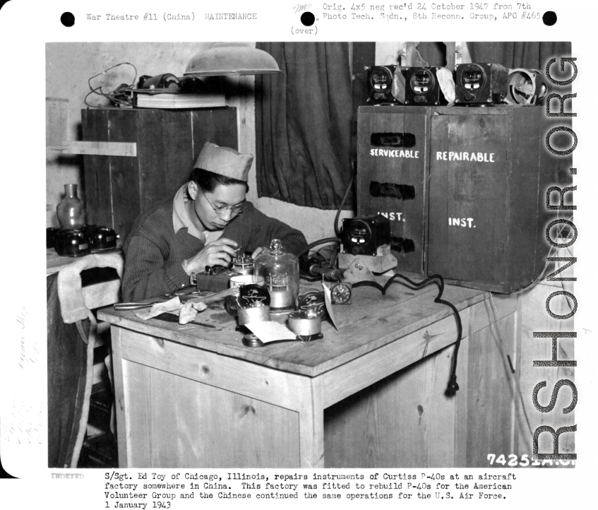 S/Sgt. Ed Toy of Chicago, Illinois, repairs instruments of Curtiss P-40s at an aircraft factory somewhere in China during WWII.  The factory was fitted to rebuild P-40s for the American Volunteer Group (AVG) and the Chinese continued the same operations for the U.S. Air Force.  January 1, 1943.