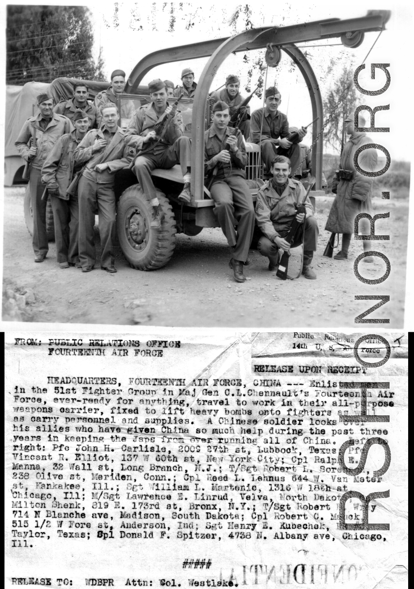 Enlisted men of the 51st Fighter Group in the 14th Air Force, with carbines in hand, travel to work in their all-purpose weapons carrier, fixed to lift heavy bombs onto fighters as well as carry personnel and supplies. A Chinese soldier looks on.  Left to right: Pfc. John H. Carlisle, Pfc. Vincent R. Elliot, Cpl. Ralph E. Manna, T/Sgt. Robert L. Sorenson, Cpl. Reed L. Lehnus, Cpl. Milton Shenk, Sgt. William L. Martenic, M/Sgt. Lawrence E. Linrud, Robert H. Wray, Cpl. Robert C. Mauck, Sgt. Henry E. Kubechek,