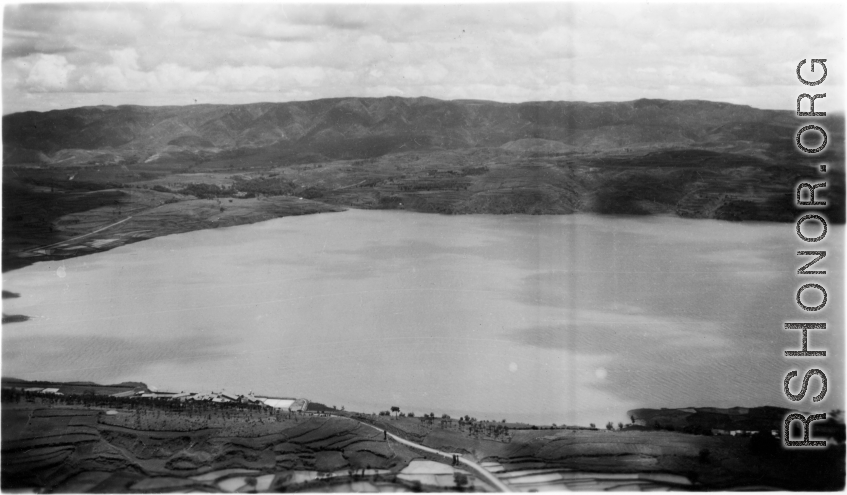 Yangzonghai lake (阳宗海) to the east of Kunming, near the U.S. Camp Schiel rest station, which can be seen in the foreground on the side of the lake.