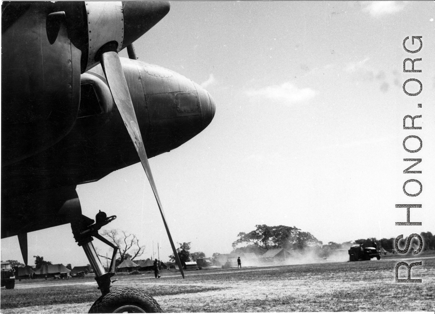 View of an Allied base from the nose of a P-38 in SW China or Burma, during WWII.