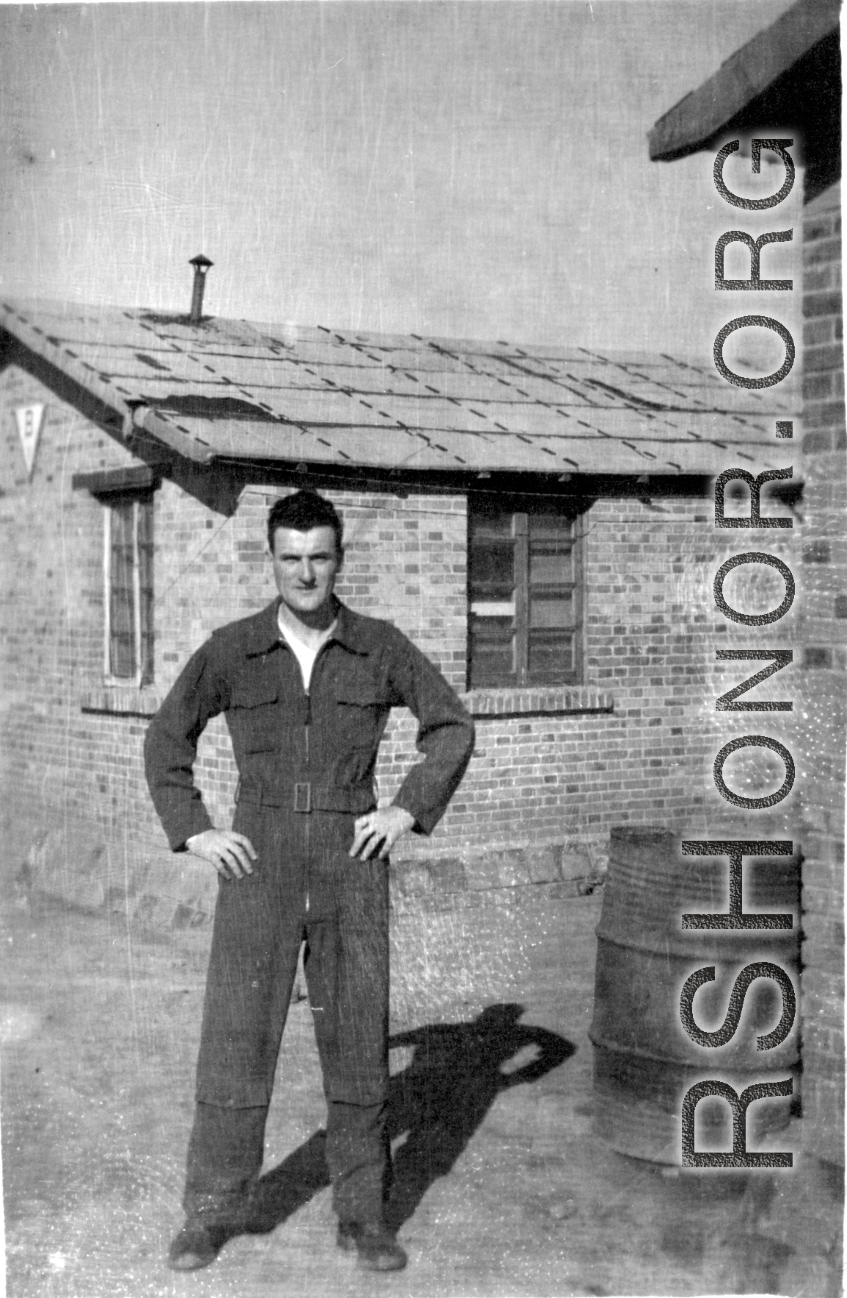 A member of the 396th Air Service Squadron poses for the camera in the hostel area of some base in China during WWII.