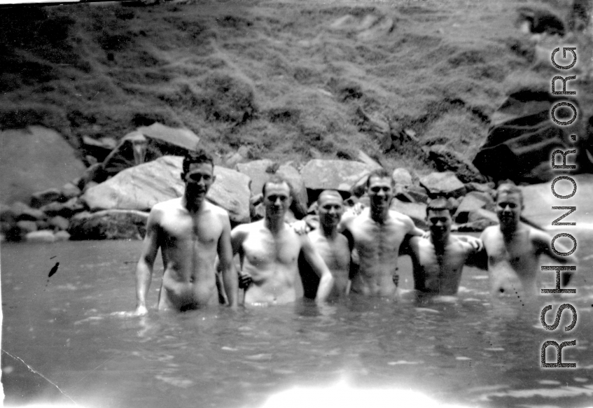 "This Is A Bunch Of 396th Guys Taking Advantage Of A Chance To Take A Bath And Enjoy A Swim At The Same Time. Sorry I Can Only Name Four Of Them. John Marlatt, Jr.,  and Dale Souder Are the First Two, And Ernie Estes And Marlin Reese At The End Of The Line."