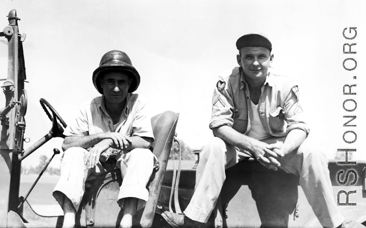 American GIs sitting on truck in the CBI, probably in Yunnan Province, China.