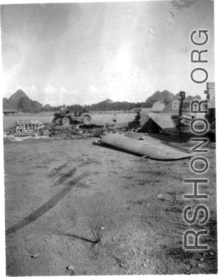 Burned American fighter, a P-51 or P-40, in Guangxi, China.