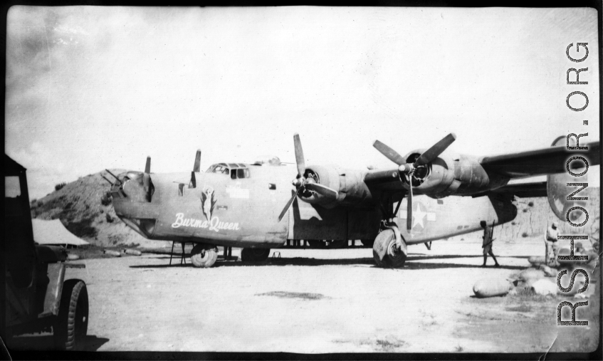 The "Burma Queen" in China during WWII. A Chinese guard keeps post in the merciful shade of the wing and a crew arms bombs on the ground not far from him.  The crew of B-25J serial #42-73253, of the 425th Squadron, got lost in weather during return from bombing the city of Changsha on 22 July. When fuel ran out they were forced to bail out in the vicinity of Tsuyung, China. All returned to Kunming without serious injury by 28 July. Crew members that mission were:  2nd Lt. John P. Burkett (pilot) 2nd Lt. W.I