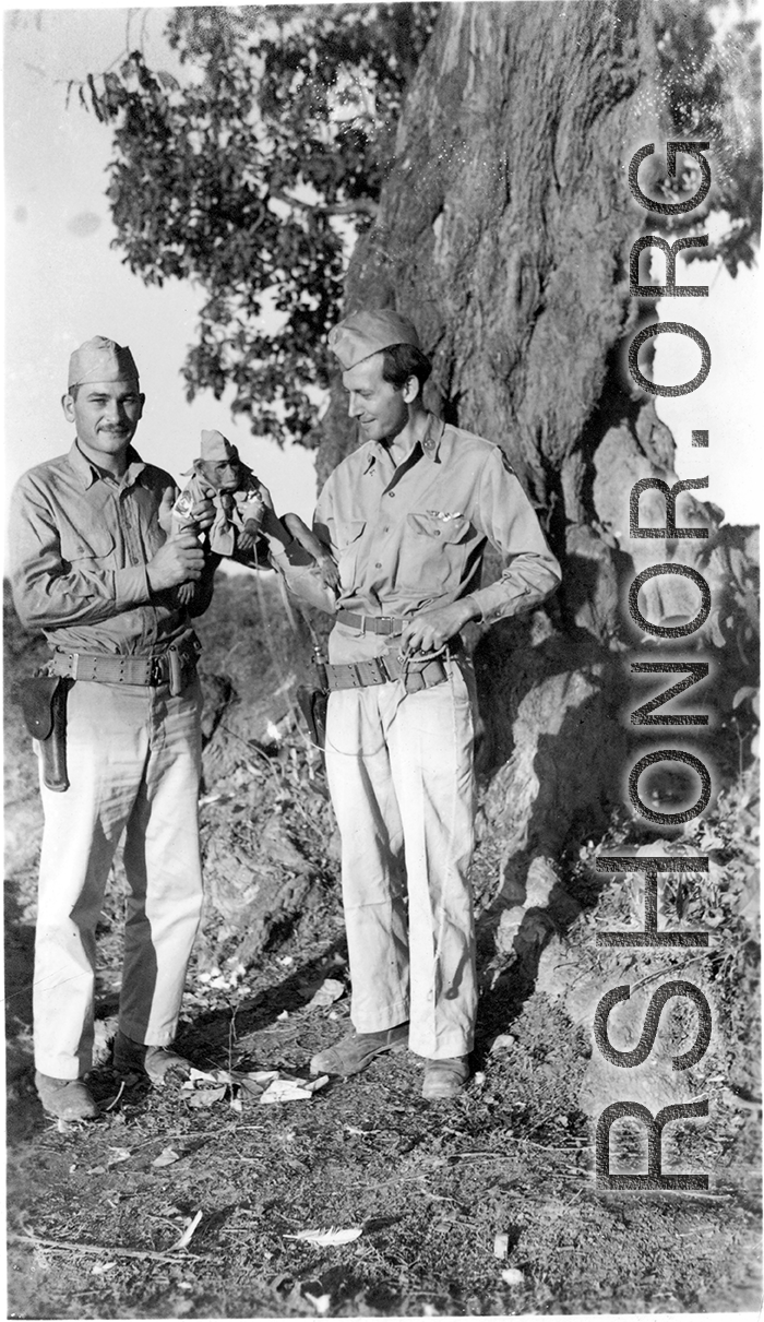 GIs play with pet monkey in CBI during WWII. Eugene Wozniak on right. Photo was addressed to "Mr. Jimmy McGivern, Jersey City, NJ. Charlie, Chico, & Eugene"