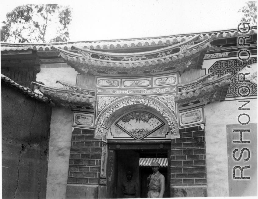 Ornate door, especially characteristic of some areas in Yunnan, Yunnan province, China. Door to a compound appropriated by Nationalist soldiers. During WWII.