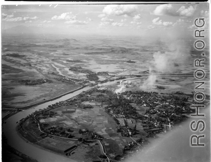 Bombing on Phu Lang Thuong railway bridge over the Thuong River at Bắc Giang City in French Indochina (Vietnam), during WWII. In northern Vietnam, and along a critical rail route used by the Japanese.  Coordinates:  21°16'32.69"N 106°11'9.28"E