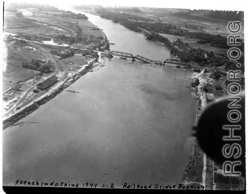 Bombing of Đò Lèn Bridge in Hà Trung Town in French Indochina (Vietnam), during WWII. In northern Vietnam, and along a critical rail route used by the Japanese.