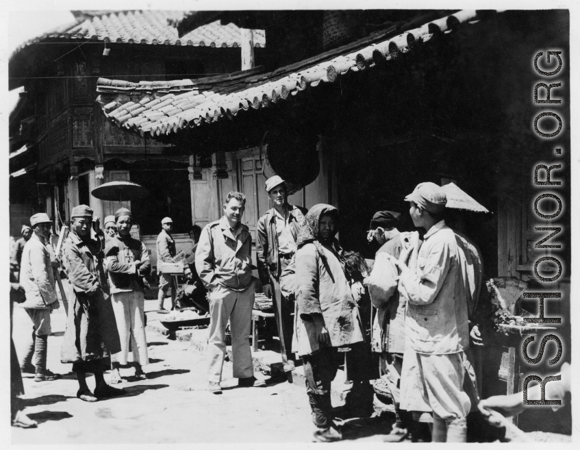 Flyers visit village near and American base is SW China. 22nd Bombardment Squadron, during WWII.