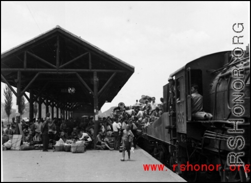 Chinese refugees at the train station in Liuzhou during WWII, in the fall of 1944, as the Japanese advanced during the Ichigo campaign.