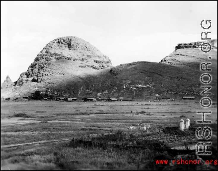 Air base buildings at the base of a karst mountain at the US base at Guilin, in Guangxi province, China, during WWII.