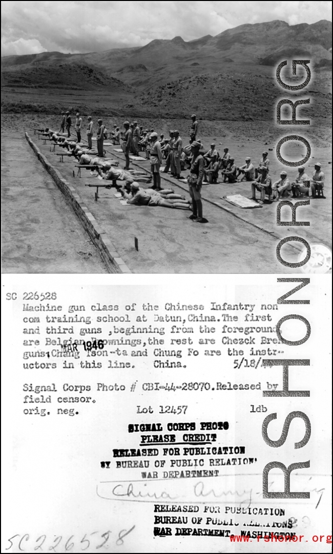 Machine gun class of the Chinese Infantry non com training school at Dutan, China.  The first and third guns, beginning from the foreground, are Belgian Brownings, the rest are Chezck Bren guns.  Chang Tson-ta and Chung Fo are the instructors in this line. China. 18 May 1944