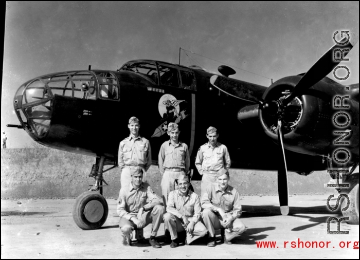 Unidentified aircrew members of the 491st Bombardment Squadron at Chakulia AB, India. The Squadron's early emblem (1942-43) representing "The Bomb Jockeys" shows clearly on the side of the B-25C. The insigne was not officially accepted. Late in 1943, their "Ringers Squadron" moto and emblem were accepted. (Information courtesy of Tony Strotman)