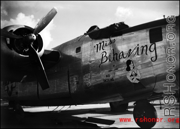 A B-24 named 'Miss Behaving' in the CBI.