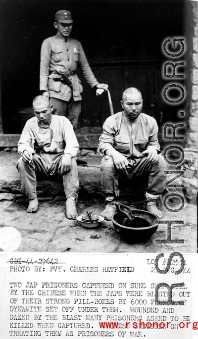 During WWII, two Japanese prisoners captured on Sung Shan Hill by the Chinese.