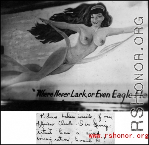 '"Picture taking inside of our officers' club. Our group artist has a vivid imagination, hasn't he?" Female nude pictorial with "Where Never Lark, or Even Eagle Flew" written below. In the CBI during WWII. From the collection of David Firman, 61st Air Service Group.