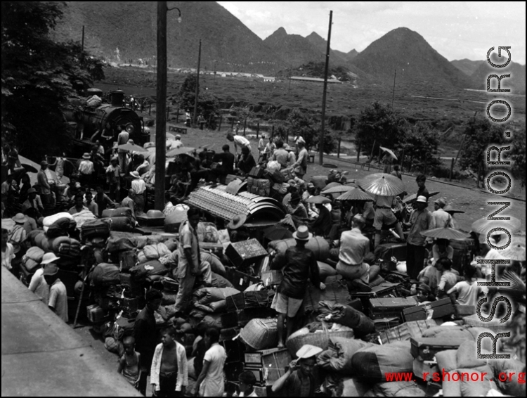 Refugees fleeing at the Guilin train station during the evacuation before the Japanese Ichigo advance in 1944, in Guangxi province. Selig Seidler was a member of the 16th Combat Camera Unit in the CBI during WWII.