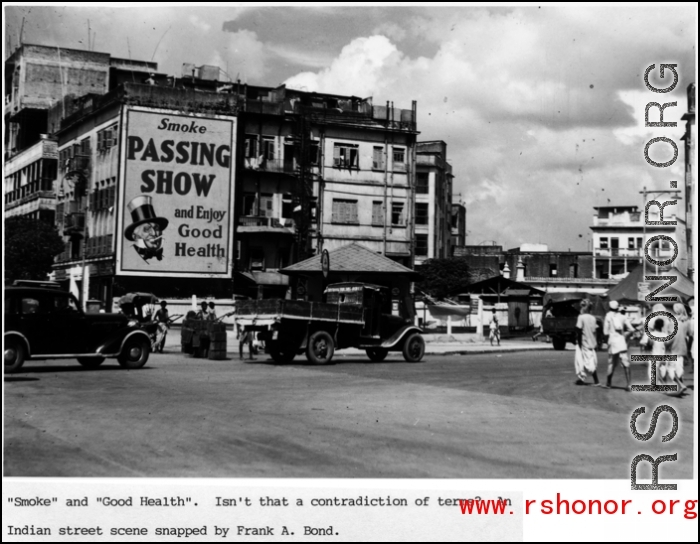 Street scene and large billboards in India during WWII.  Photo from Frank A. Bond.
