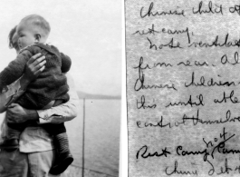 Child standing at Camp Schiel, China, February 1945, with lake behind.