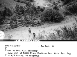 September 14, 1944  Long shot of 150MM Krupp Howitzer gun, 10th Artillery Regiment 11th A/G, firing on Lungling.  Photo by Pvt. W. E. Shemorry.  In Yunnan province, China (CBI), in WWII.