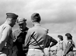 Chennault talks with officers in the CBI during WWII.