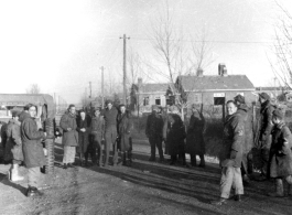 Soldiers and civilian in cold northern China during WWII.