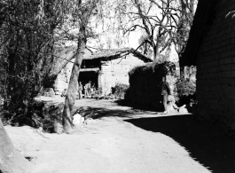 Local people in China whiling the time in a village corner.  From the collection of Eugene T. Wozniak.