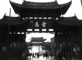 The Golden Horse 金马 archway in Kunming, and the other of the pair, the Emerald Rooster Archway (金马碧鸡坊), in the distance.  In the CBI during WWII.