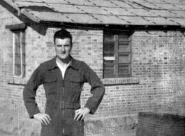 A member of the 396th Air Service Squadron poses for the camera in the hostel area of some base in China during WWII.