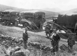 "Heading For Our new Home --After Flying The Hump Into Kunming We Moved By Truck Convoy To Our New Home In Kwelin. This Is A Photo Of The Convoy Stopped For A Break Along The Way. For The Final Leg Of This Trip We Loaded Everything On Flat Cars And Finished The Trip To Kwelin By Rail. " Caption courtesy of Elmer Bukey.