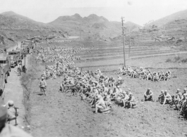 Chinese Soldiers massed and ready for convoy at Guilin just prior to evacuation of the American bases there in the face of the Japanese Ichigo campaign in late 1944.