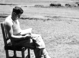 Selig Seidler, a member of the 16th Combat Camera Unit, taking a break at Guilin (Kweilin) or Liuzhou (Liuchow) base, in Guangxi province, China, during the Second World War.