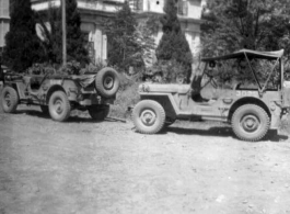 American jeeps parked in front of building used for some kind of military offices in Guangxi, China, during WWII.