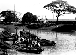 Boats on a canal in India during WWII.    From the collection of David Firman, 61st Air Service Group.