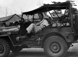 A GI in an jeep in India during WWII.  From the collection of David Firman, 61st Air Service Group.