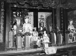 Inside a Buddhist temple in China, during WWII.