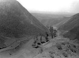 Mountains in northern China, with road, during WWII.