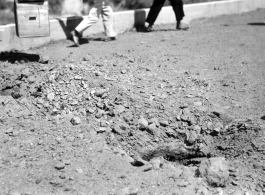 Result of explosives set on bridge by Americans in 1944 during retreat from Japanese in Guangxi province, China, during WWII.