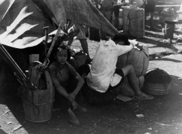 Exhausted and overheated Chinese refugees at the train station in Liuzhou during WWII, in the fall of 1944, as the Japanese advanced during the Ichigo campaign.